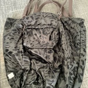 Kooba tote. Nylon, animal print, great airport bag, inside/outside side pockets